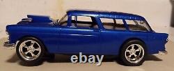 A 1/24 Scale Carrera 1934 Hot Rod Slot Car Chassis With A 1955 Chevy Nomad Body