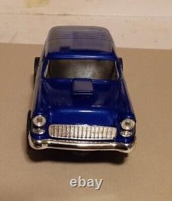 A 1/24 Scale Carrera 1934 Hot Rod Slot Car Chassis With A 1955 Chevy Nomad Body