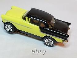 MEV, 57 OLDS YELLOWithBLK HO SLOT CAR TJET, AURORA CHASSIS (NEW IN BOX)