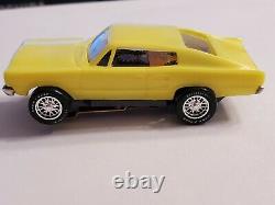 MEV 66 DODGE CHARGER YELLOW JET HO Slot Car, AURORA CHASSIS (NEW IN BOX)