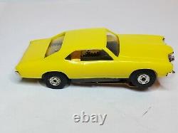 MEV 70 CYCLONE YELLOW, HO Slot Car, NOS AURORA CHASSIS (NEW IN BOX)
