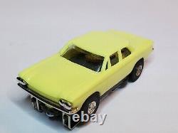 Mev, 61 Chevy Corvair 700 Yellow Ho Slot Car Tjet, Ultra Chassis (new In Box)